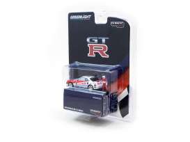 Nissan  - GT-R R34 red/white - 1:64 - Tarmac - 51185 - TC51185 | The Diecast Company