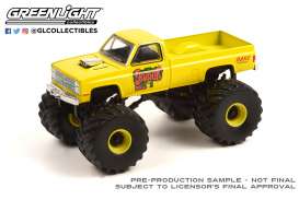 Chevrolet  - Silverado Monster Truck 1987 yellow - 1:64 - GreenLight - 49100C - gl49100C | The Diecast Company