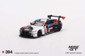 BMW  - M4 GT3 2022 white/black/red/blue - 1:64 - Mini GT - 00394-L - MGT00394lhd | The Diecast Company