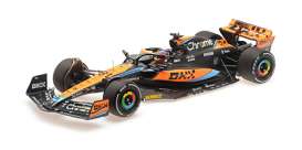 McLaren  - MCL60 2023 black/orange - 1:18 - Minichamps - 537232181 - mc537232181 | The Diecast Company