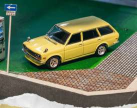 Datsun  - 510 1973 yellow - 1:64 - Tarmac - T64G-026-YL-B - TC-T64G-026-YL-BL | The Diecast Company